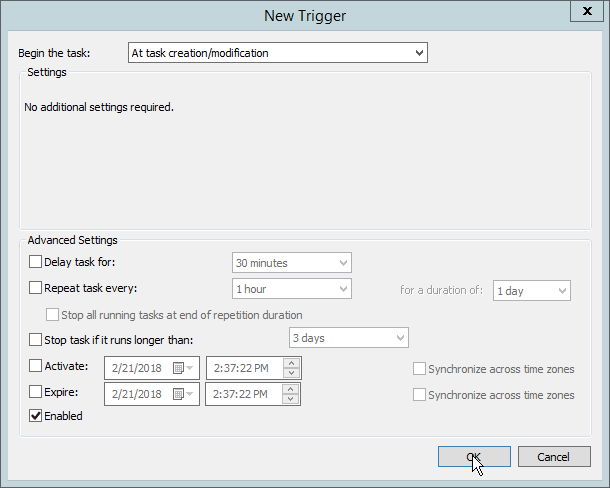A screenshot of the New Trigger dialog box. "At task creation/modification" is selected from the "Begin the task:" dropdown menu. The OK button is selected.