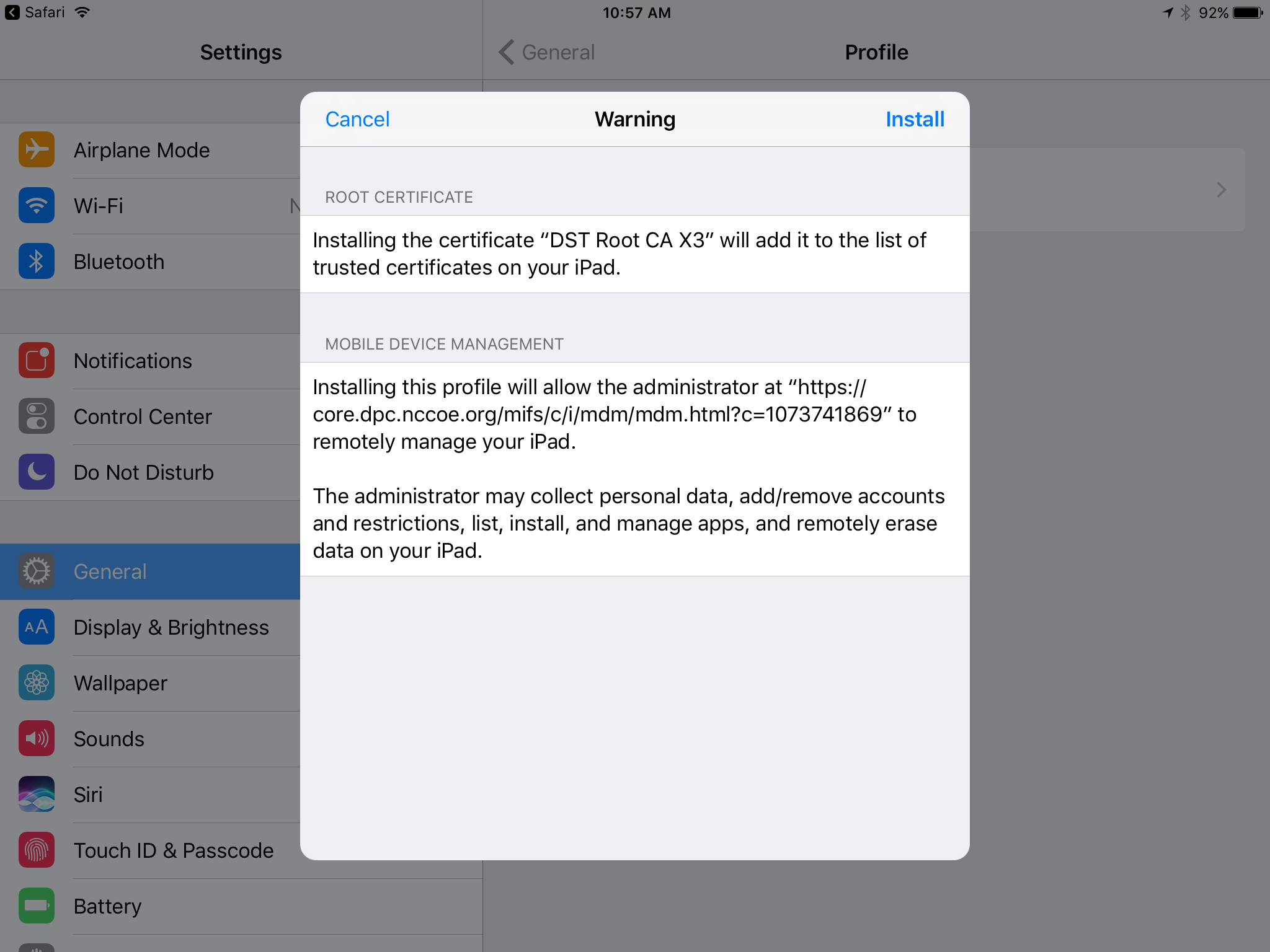 Settings app warns the user that installing the MobileIron profile includes a Root Certificate and Mobile Device Management and summarizes potential hazards to the user.