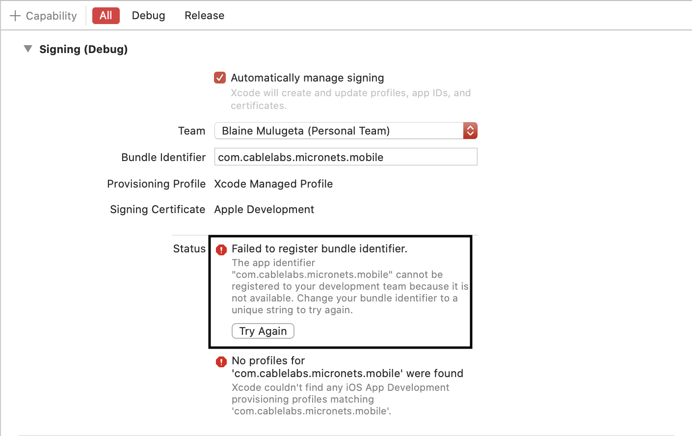This image shows the "Failed to register bundle identifier" error.