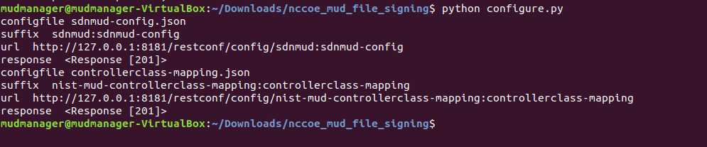 This image shows the command "python configure.py" being run on the MUD Manager.