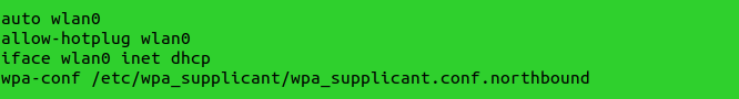 This image shows the line "wpa-conf /etc/wpa_supplicant/wpa_supplicant.conf.northbound" being added to the /etc/network/interfaces file.