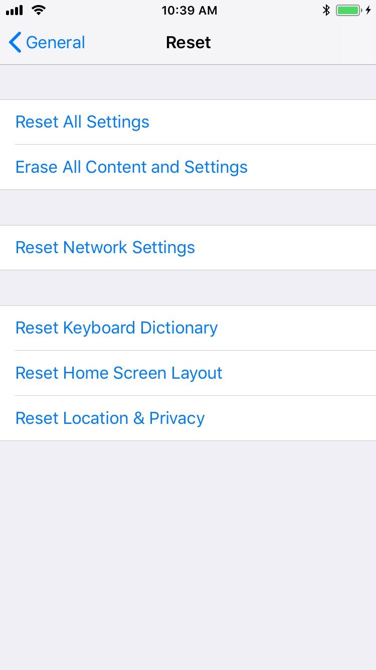 iOS > Settings > General > Reset Displays options for the reset of content and data on the device.