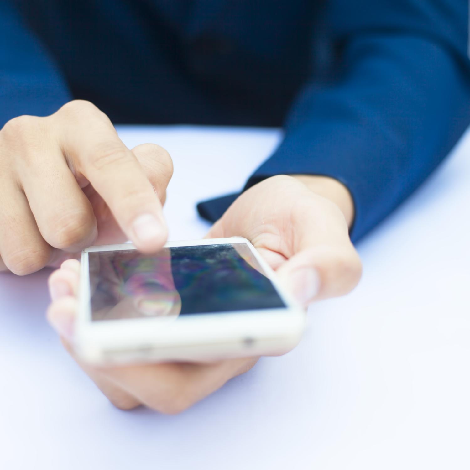 Business person using a smartphone 