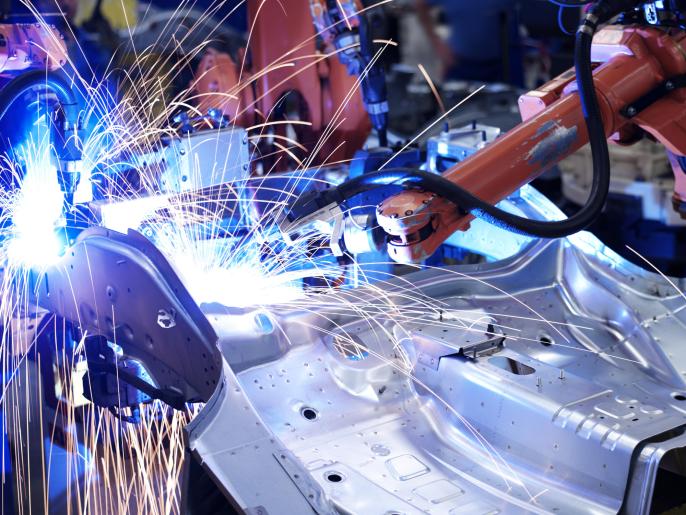 Tobots manufacturing in a factory