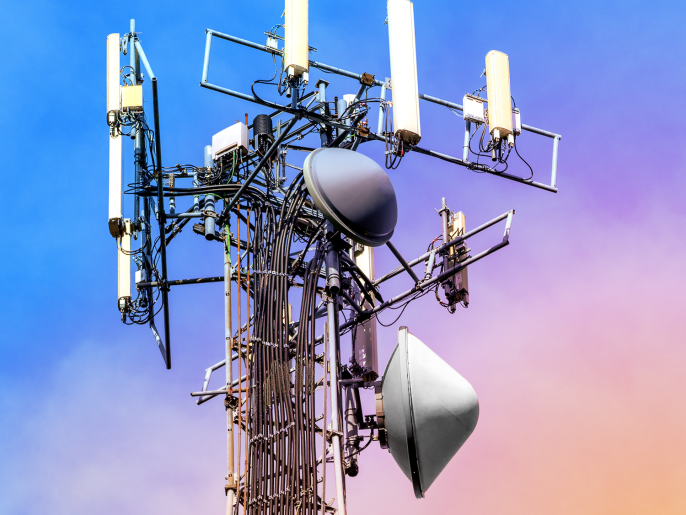A color enhanced photograph of a cellular tower.