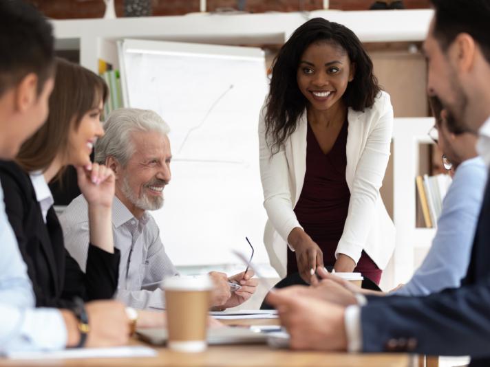 Group of professionals gathered around a table