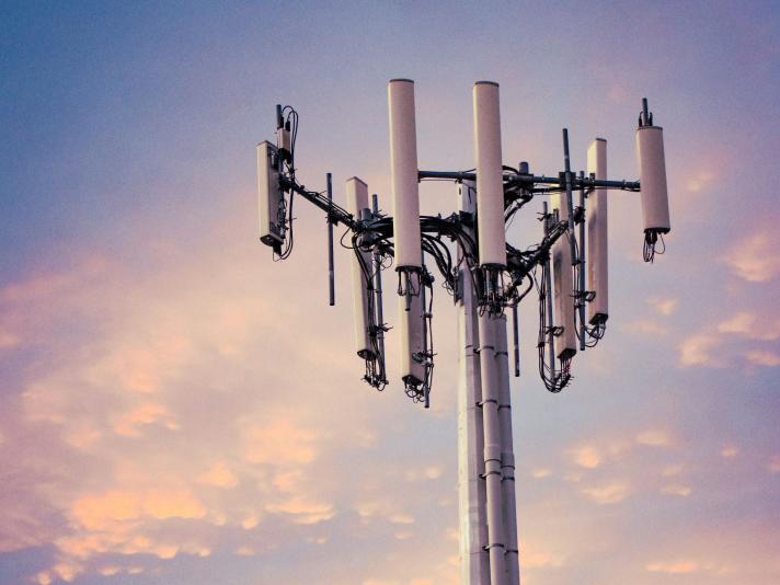 5G tower with sunset in background.