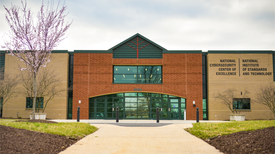 A photograph of the front of the National Cybersecurity Center of Excellence building.